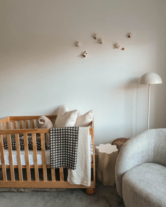 Calm nursery featuring Leni Choc Gingham Swaddle