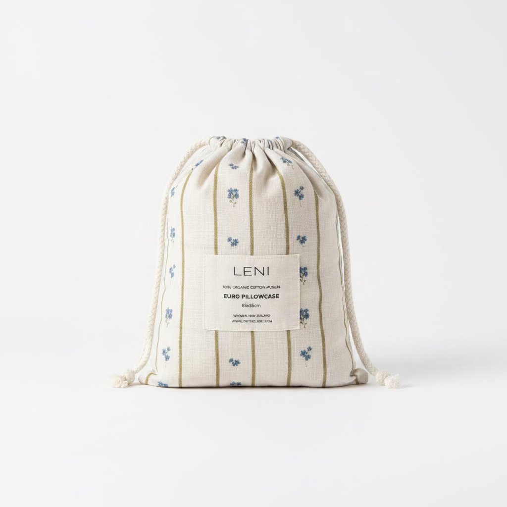 Leni euro pillowcase in a drawstring bag on a textured surface